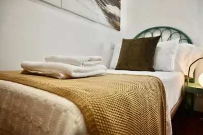 Cama o camas de una habitación en For You Rentals Vivienda TEMPORAL de cuatro dormitorios en Arganzuela AMA1026