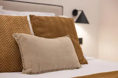 Cama o camas de una habitación en Gran Via XV 4BR 4BH