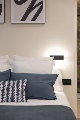 Cama o camas de una habitación en Gran Via XV 4BR 4BH