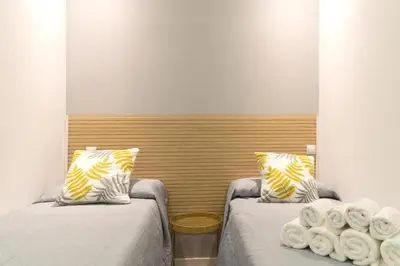 Cama o camas de una habitación en Precioso apartamento junto a Plaza Mayor