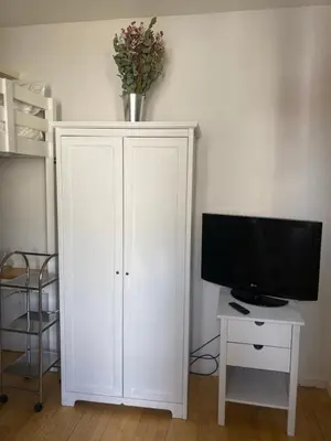Una televisión o centro de entretenimiento en Apartamento en el casco antiguo