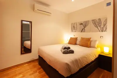 Cama o camas de una habitación en Piso con dos dormitorios frente a Plaza Mayor
