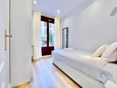 Cama o camas de una habitación en Puerta de Toledo VII - Apartamento de 2 dormitorios con Balcón