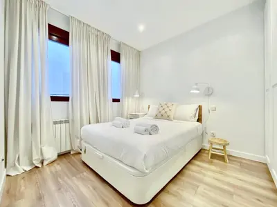 Cama o camas de una habitación en Puerta de Toledo VII - Apartamento de 2 dormitorios con Balcón