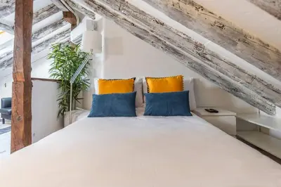 Cama o camas de una habitación en Estudio Centro Gran Via Tarifa Mensual disponible