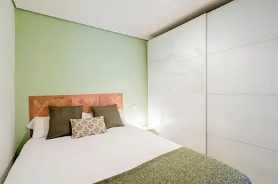 Cama o camas de una habitación en Homelike Lavapies 2 bedroom