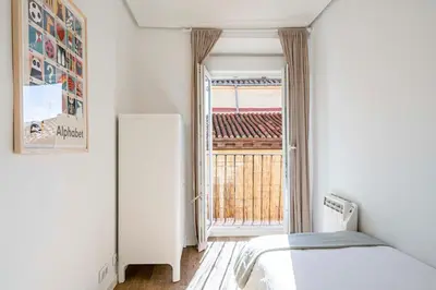 Cama o camas de una habitación en Homelike Lavapies 2 bedroom