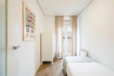 Cama o camas de una habitación en Homelike Lavapies 2 bedroom