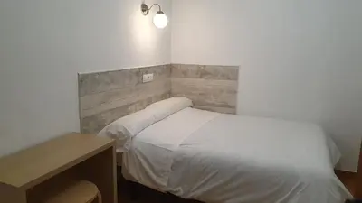 Cama o camas de una habitación en Hostal Ginebra -Madrid Centro Gran Vía Sol-