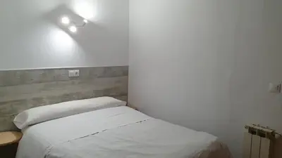 Cama o camas de una habitación en Hostal Ginebra -Madrid Centro Gran Vía Sol-