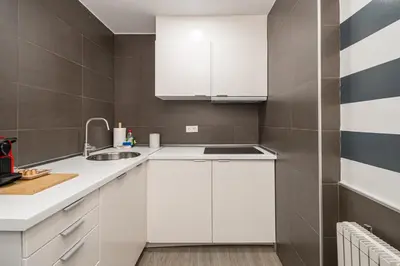 Una cocina o zona de cocina en Céntrico Plaza España - Gran Vía II