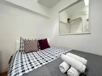 Cama o camas de una habitación en Acogedor Mesón Centro Temporal
