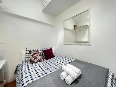 Cama o camas de una habitación en Acogedor Mesón Centro Temporal