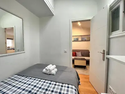 Cama o camas de una habitación en Acogedor Mesón Centro Temporal