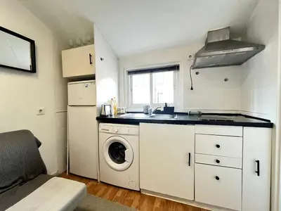 Una cocina o zona de cocina en Acogedor Mesón Centro Temporal
