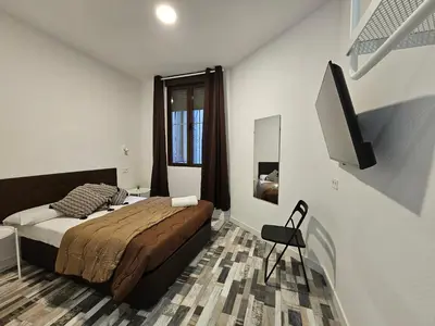 Cama o camas de una habitación en HOSTAL ANDREA GRANVIA