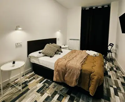 Cama o camas de una habitación en HOSTAL ANDREA GRANVIA