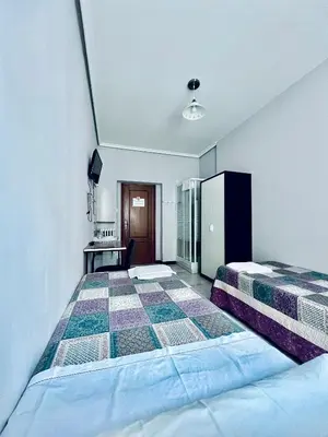 Cama o camas de una habitación en Hostal Conde De Alba