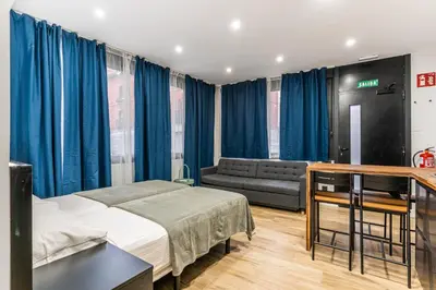 Cama o camas de una habitación en VR LATINA APARTMENTS