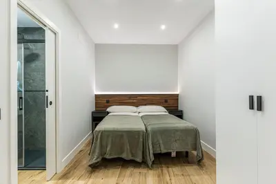 Cama o camas de una habitación en VR LATINA APARTMENTS