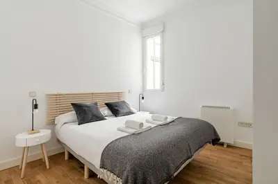 Cama o camas de una habitación en GuestReady - Spanish Pulse near Plaza Mayor
