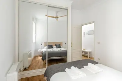 Cama o camas de una habitación en GuestReady - Spanish Pulse near Plaza Mayor