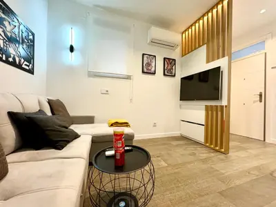 Una televisión o centro de entretenimiento en Luxury Prívate Flat in Madrid Center Full Equipe NON TOURISTY