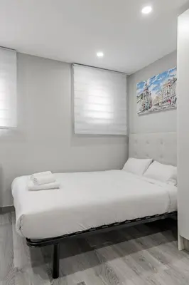 Cama o camas de una habitación en GuestReady - Cozy studio in Madrid's Heart