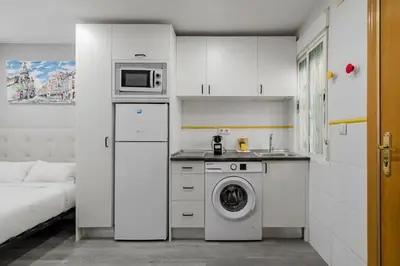 Una cocina o zona de cocina en GuestReady - Cozy studio in Madrid's Heart