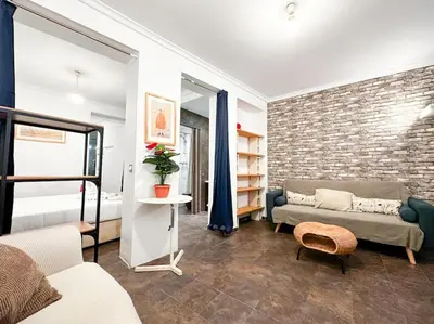 Cama o camas de una habitación en Urbano y acogedor estudio en sótano
