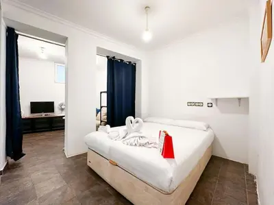 Cama o camas de una habitación en Urbano y acogedor estudio en sótano