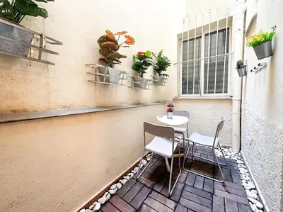 Un balcón o terraza de Urbano y acogedor estudio en sótano