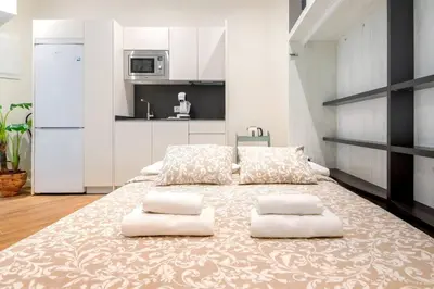 Cama o camas de una habitación en Palacio Real Ópera La latina