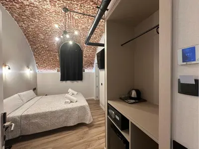 Cama o camas de una habitación en CC Opera Suites