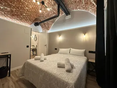 Cama o camas de una habitación en CC Opera Suites