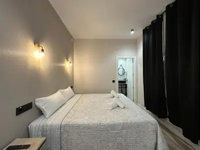 Cama o camas de una habitación en CC Opera Suites