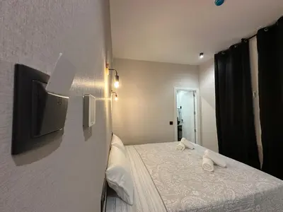 Cama o camas de una habitación en CC Opera Suites