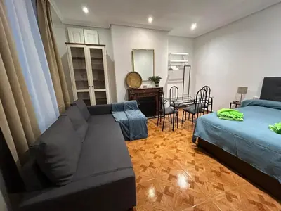 Cama o camas de una habitación en Habitaciones Figueroa