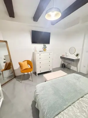 Una televisión o centro de entretenimiento en Madrid BeautyFlat for Six