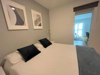 Cama o camas de una habitación en HUERTAS FLAT