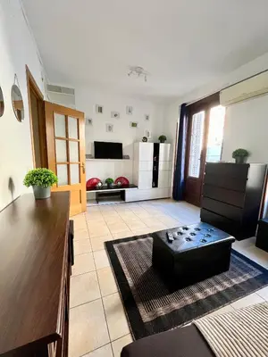 Una televisión o centro de entretenimiento en Madrid Charm 2BD private flat - CITY CENTER