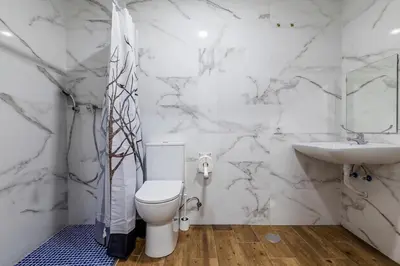 Un baño de AYZ Luis Cabrera-Auto check-in property