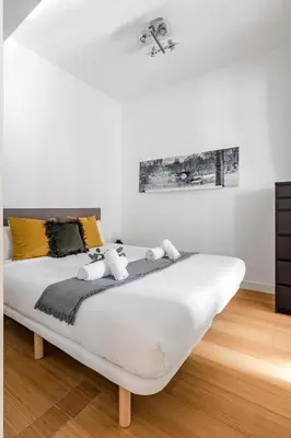 Cama o camas de una habitación en Tirso de Molina III - Apartamento de 2 dormitorios