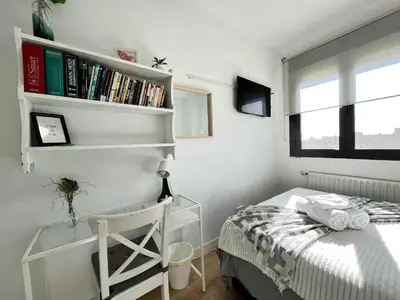Cama o camas de una habitación en Habitación Atocha Mendez