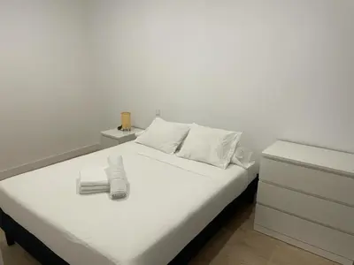 Cama o camas de una habitación en U2 Apartamento cerca de Metro