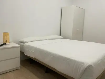 Cama o camas de una habitación en U2 Apartamento cerca de Metro