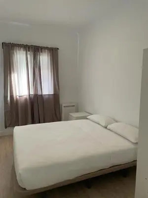 Cama o camas de una habitación en U3 Apartamento bien comunicado Madrid centro