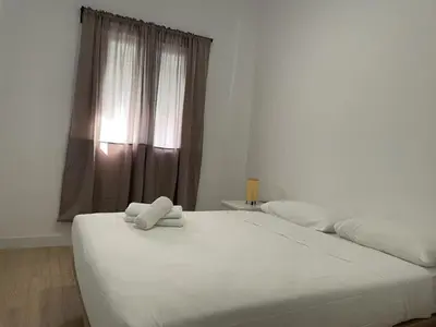 Cama o camas de una habitación en U3 Apartamento bien comunicado Madrid centro