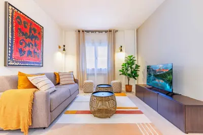 Zona de estar de Apartamento Puerta de America VII en Madrid