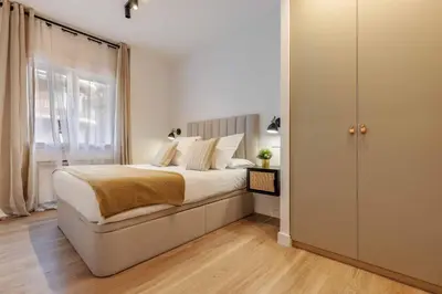 Cama o camas de una habitación en Apartamento Puerta de America VII en Madrid